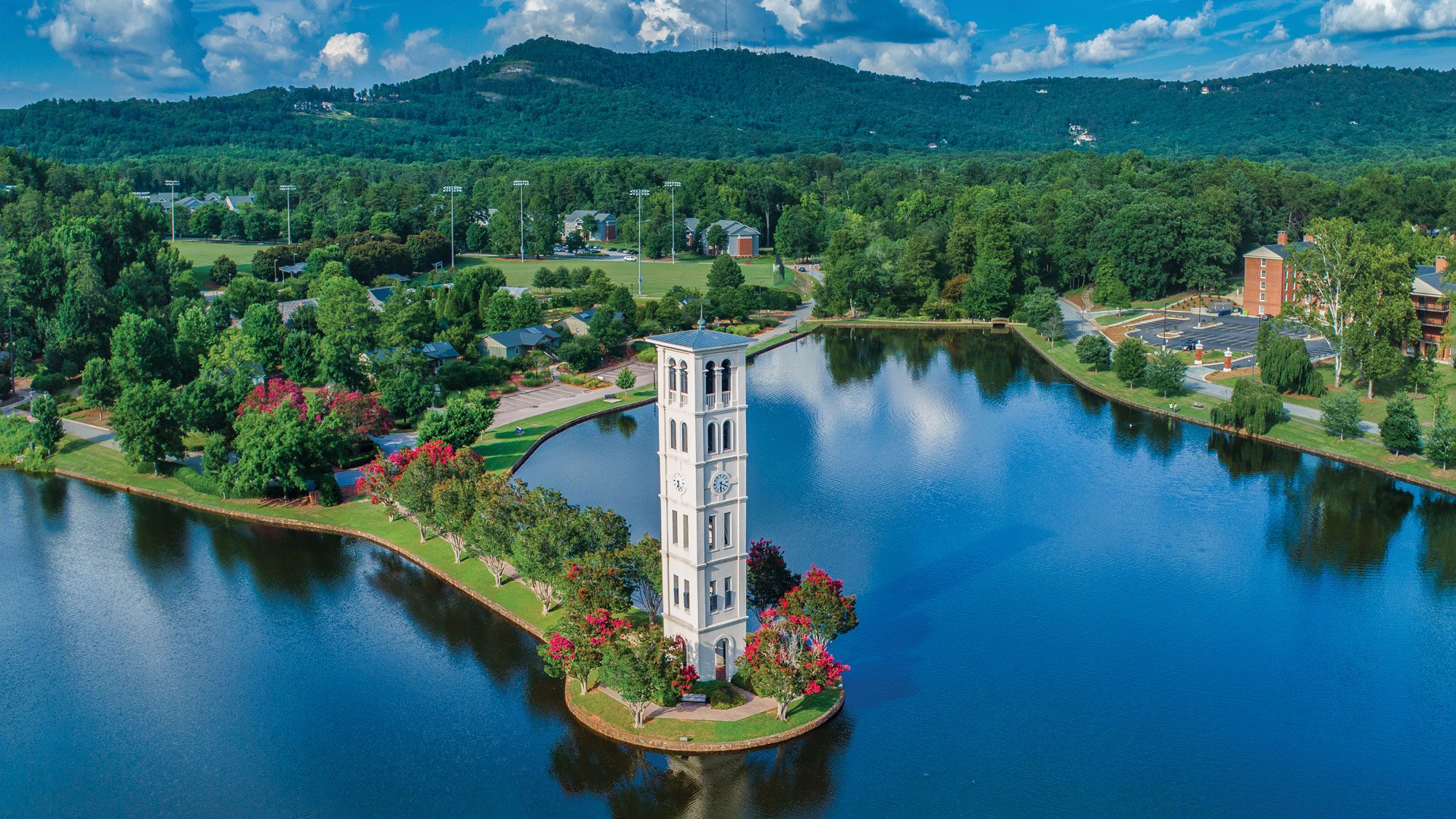 Bird's eye view of Furman lake and belltower in the spring