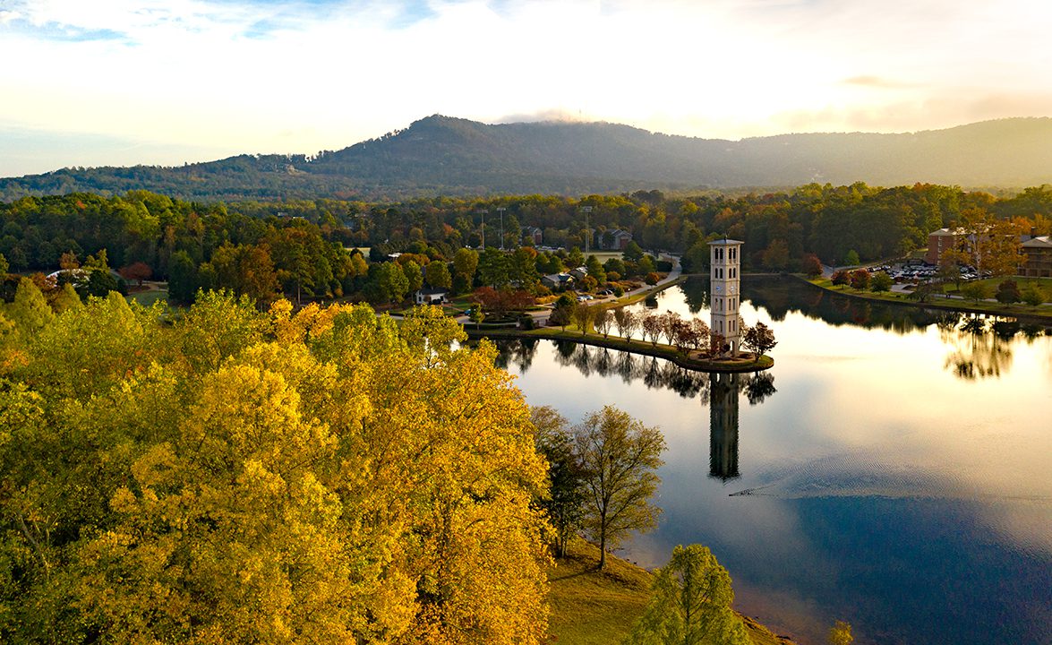 A crisp fall morning view of Furman lake and campus 