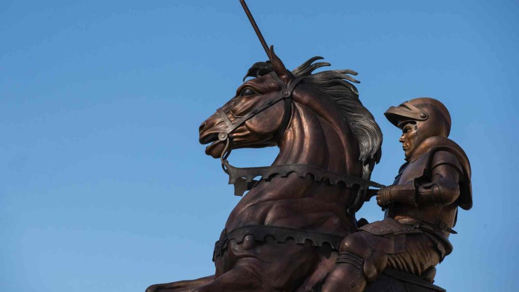 paladin statue against blue skies