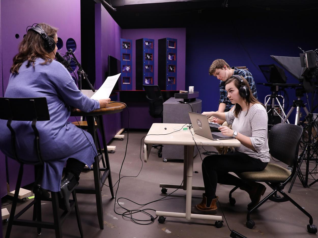 Comms podcast booth
