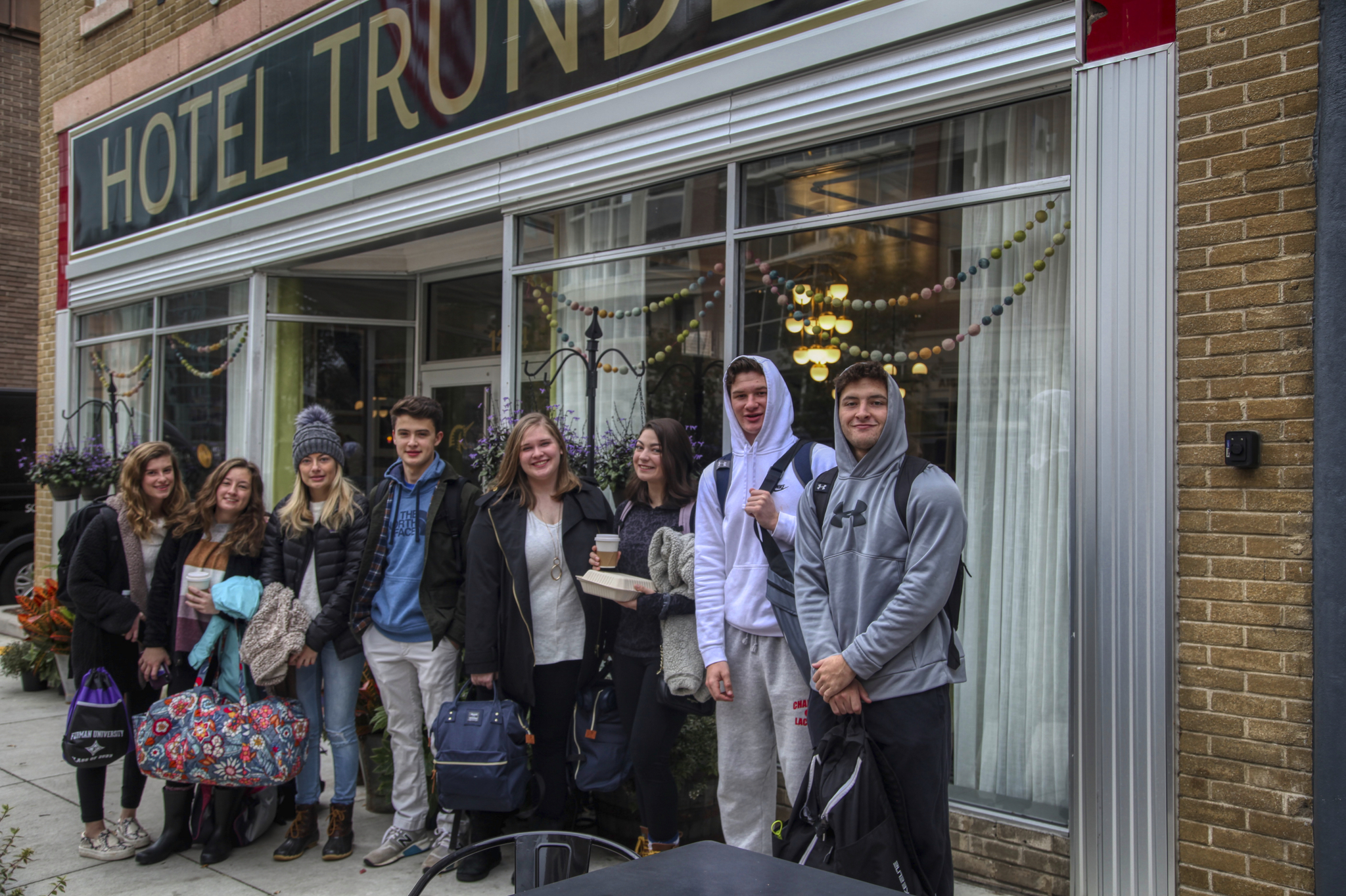 English students outside hotel