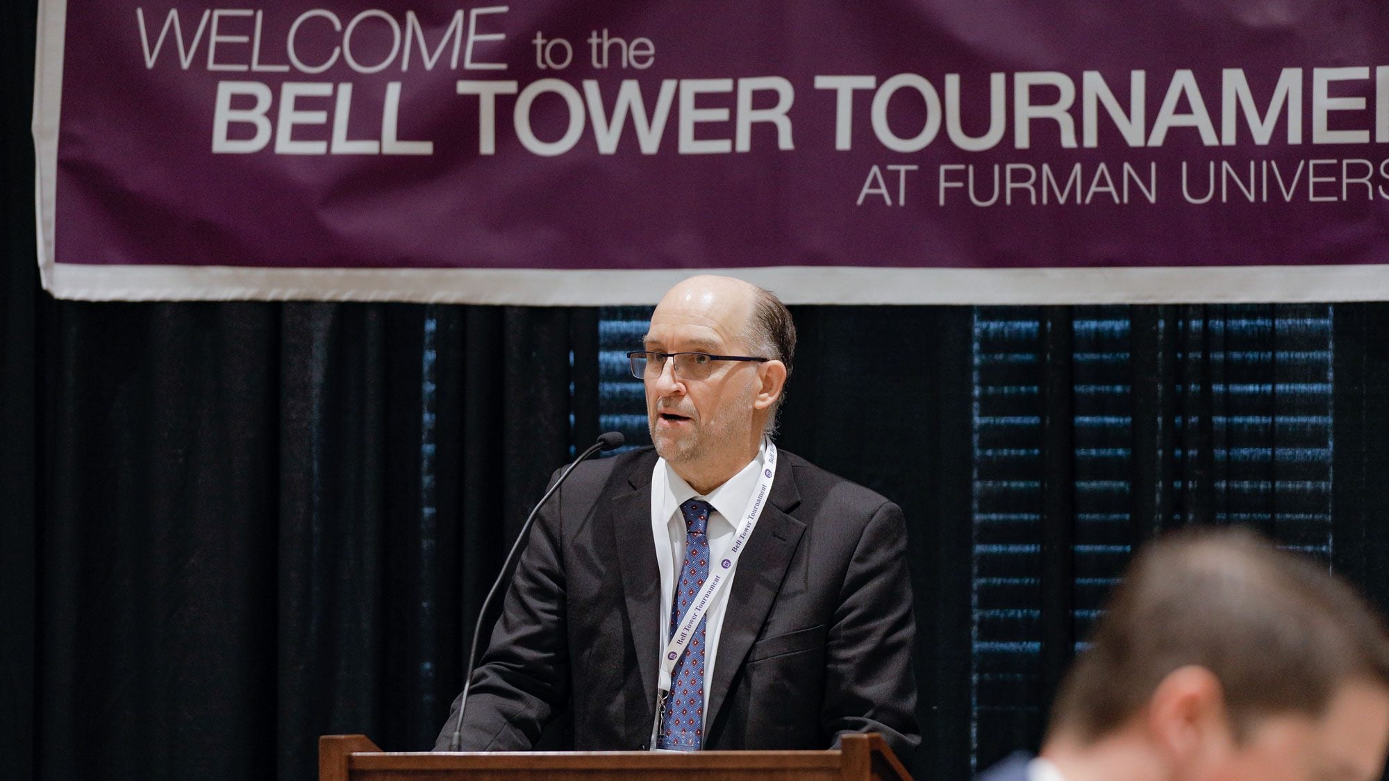 Professor giving opening speech for Bell Tower Tournament