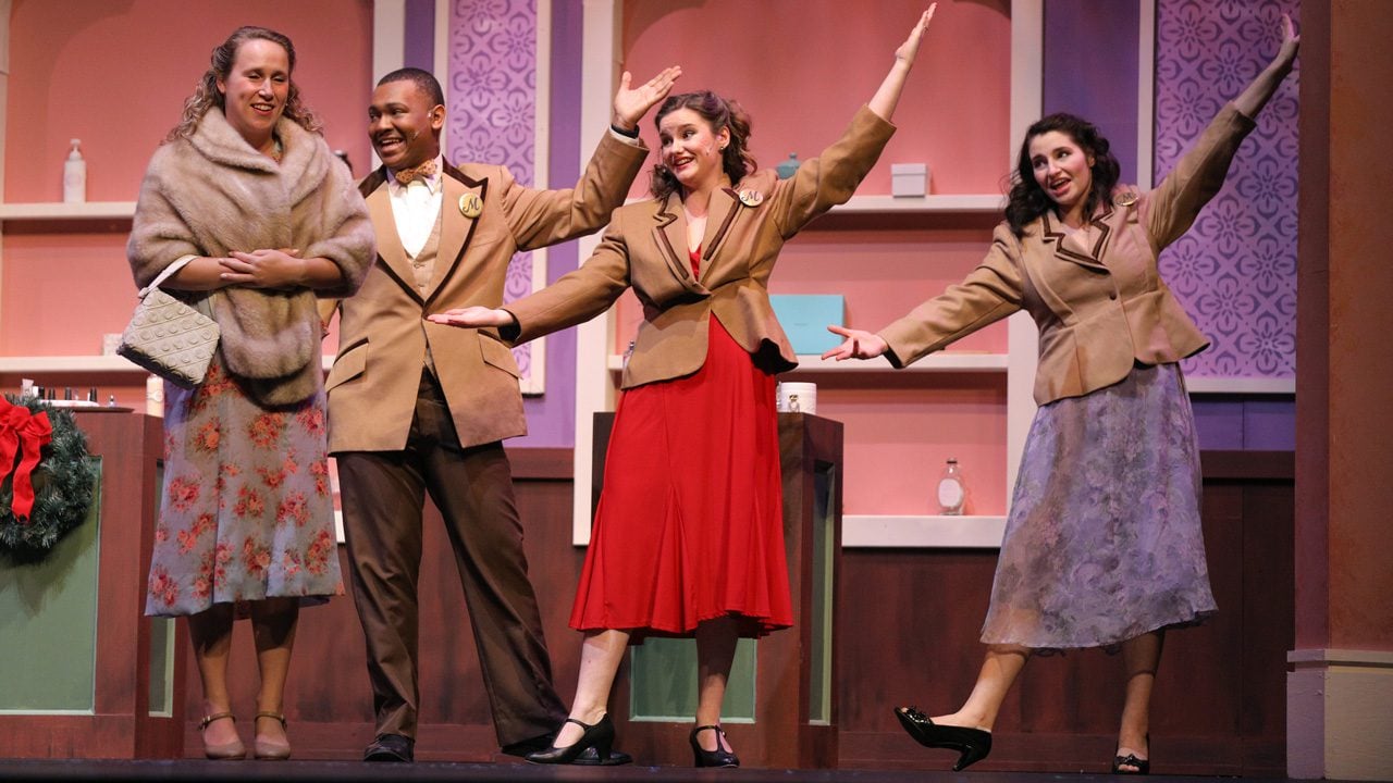 Students singing in dancing in a musical