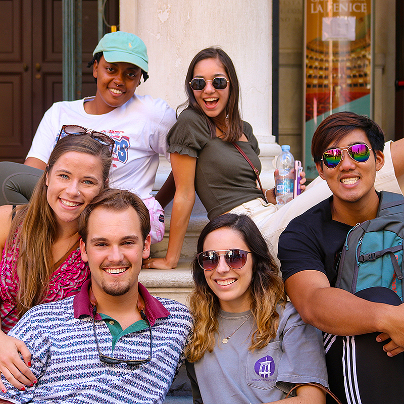 image of six furman students on steps in Italy