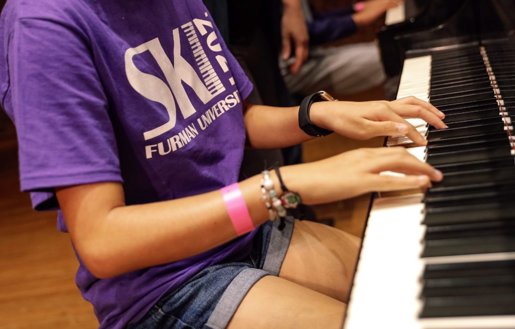 Summer Keyboard Institute 2021 camper at piano