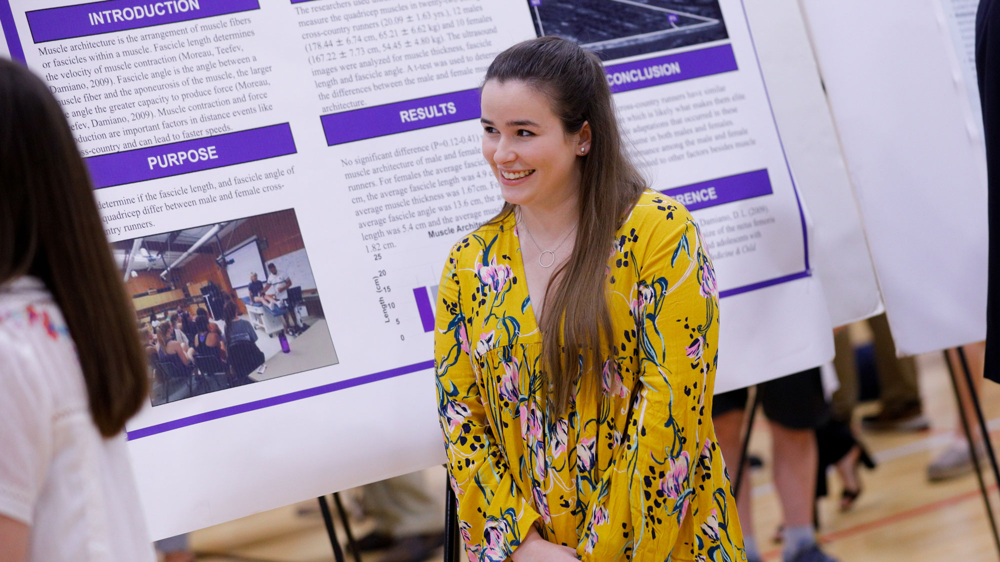 Student giving poster presentation during Furman Engaged