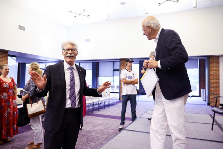 Olivier Zunz discusses Tocqueville with audience member at Tocqueville Center
