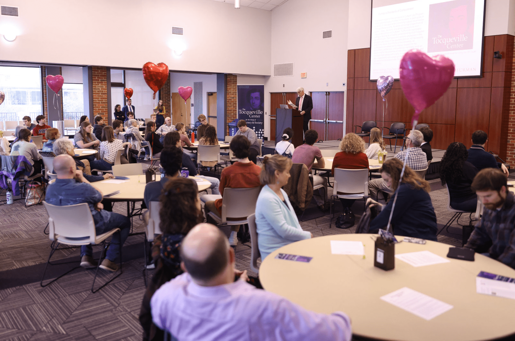 Tocqueville Center discussion, including how community programs help single-parent families