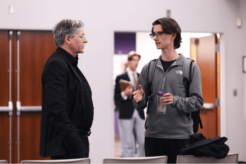 Dr. Jan-Werner Müller speaks with a Furman University student during a Tocqueville Center event on populism and democracy.