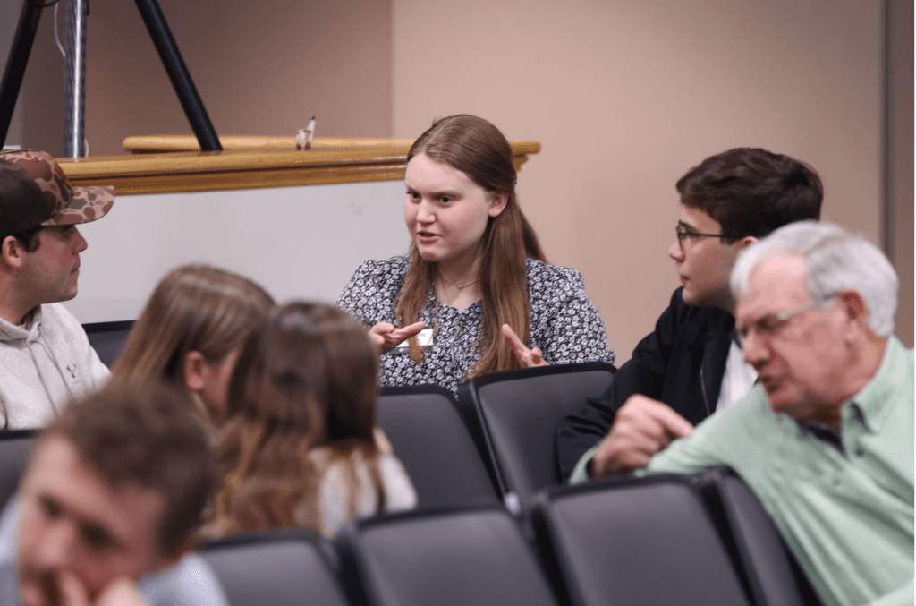 Students and community members engage in small group discussions during the Populism: On Discourse event hosted by the Tocqueville Center.