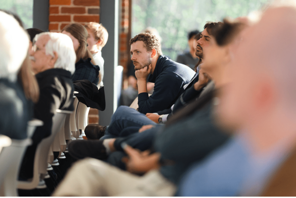 Audience members listen to panelists discuss populism, democracy, and global politics at the Tocqueville Center’s Populism in America event at Furman University.