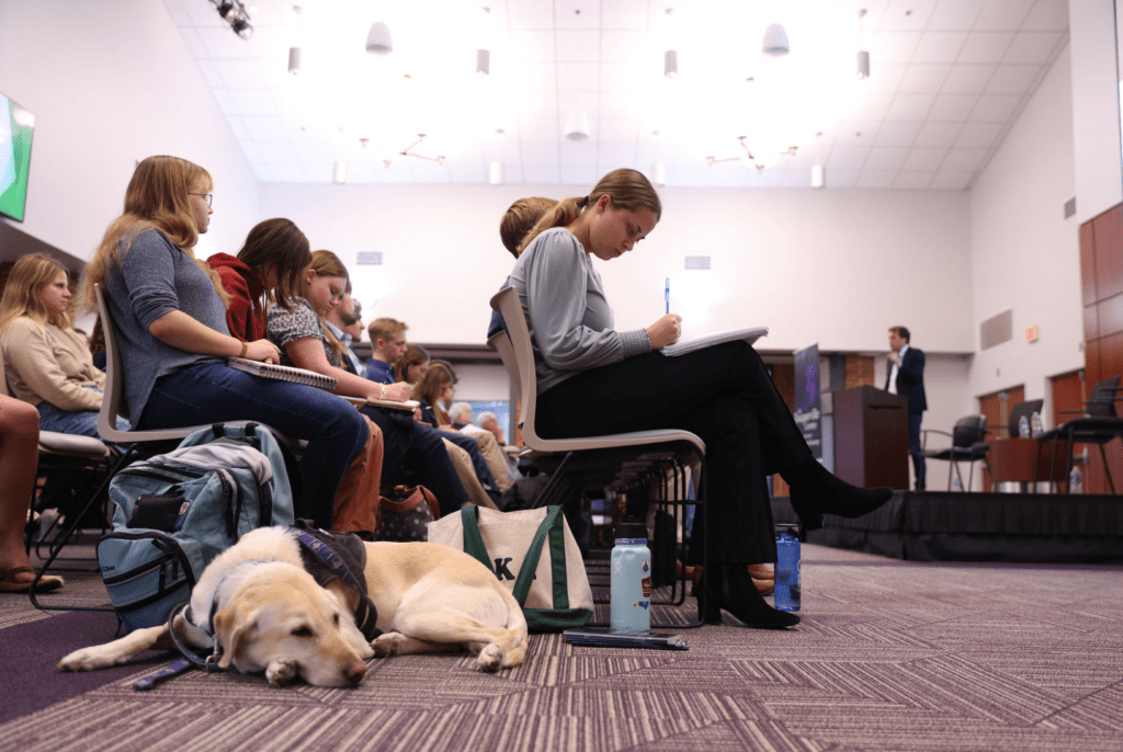 Students listen to Liesbet Hooghe, Gary Marks, Matthias Matthijs, and Marian Stroble in a Tocqueville Center panel on democracy and transatlantic politics.