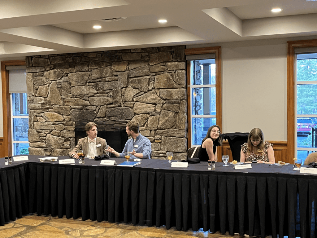 Tocqueville Fellows in discussion at a seminar at the Tocqueville Fellows reatreat.