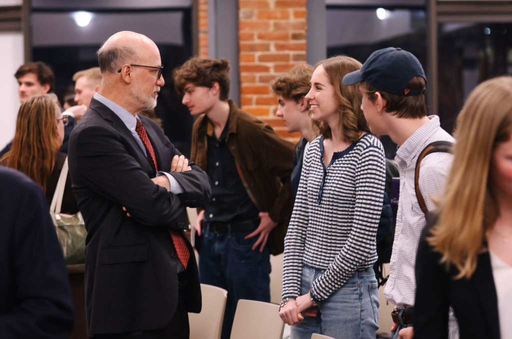 Tocqueville Fellows continue the conversation with guest speakers after a Tocqueville Center lecture on religion and American foreign policy.