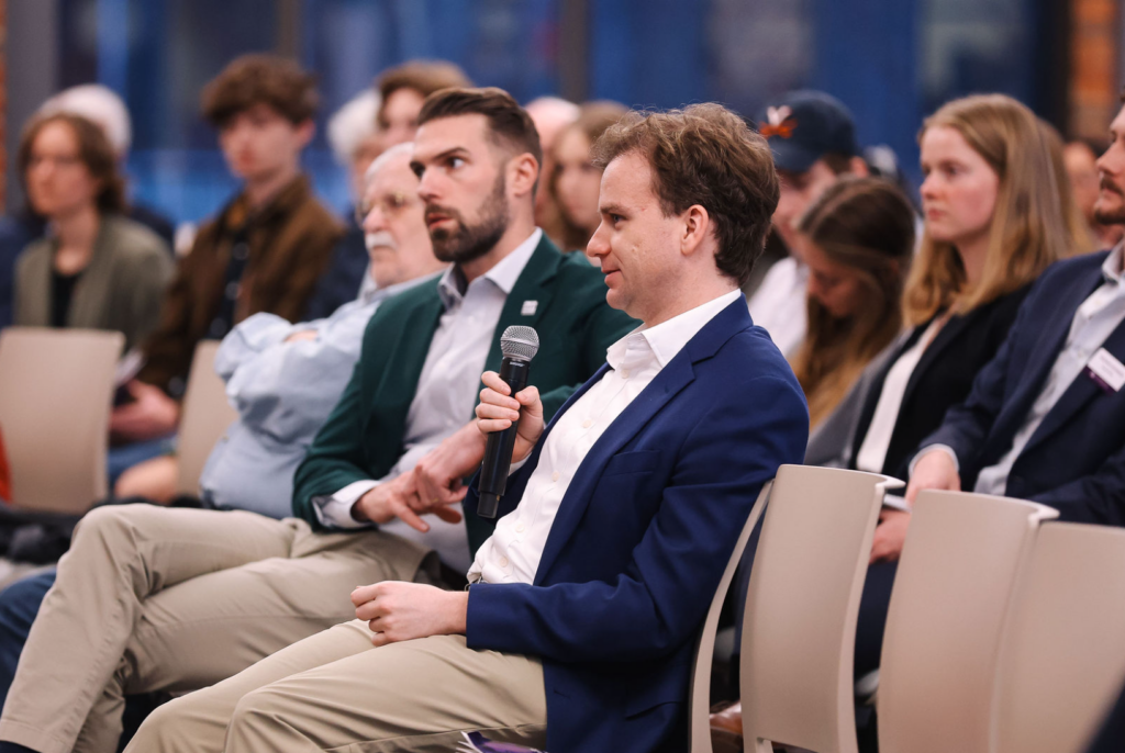 An audience member asks a question during a Tocqueville Center discussion on religion and American foreign policy at Furman University.