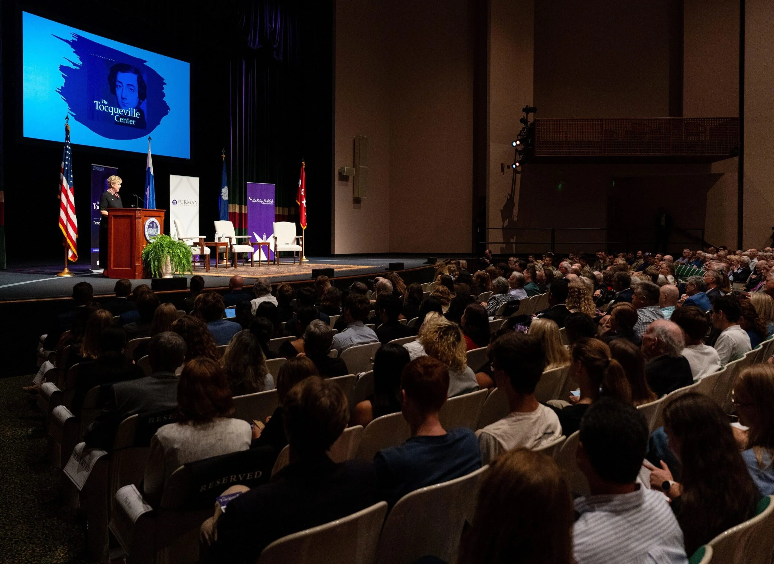 Furman President Elizabeth Davis on stage with a Tocqueville Center event.