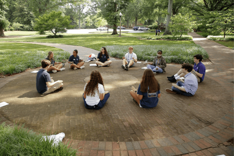Furman Students sitting in a circle