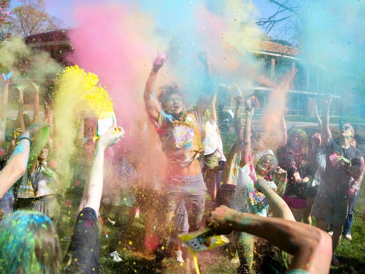 Students celebrating with colors outside