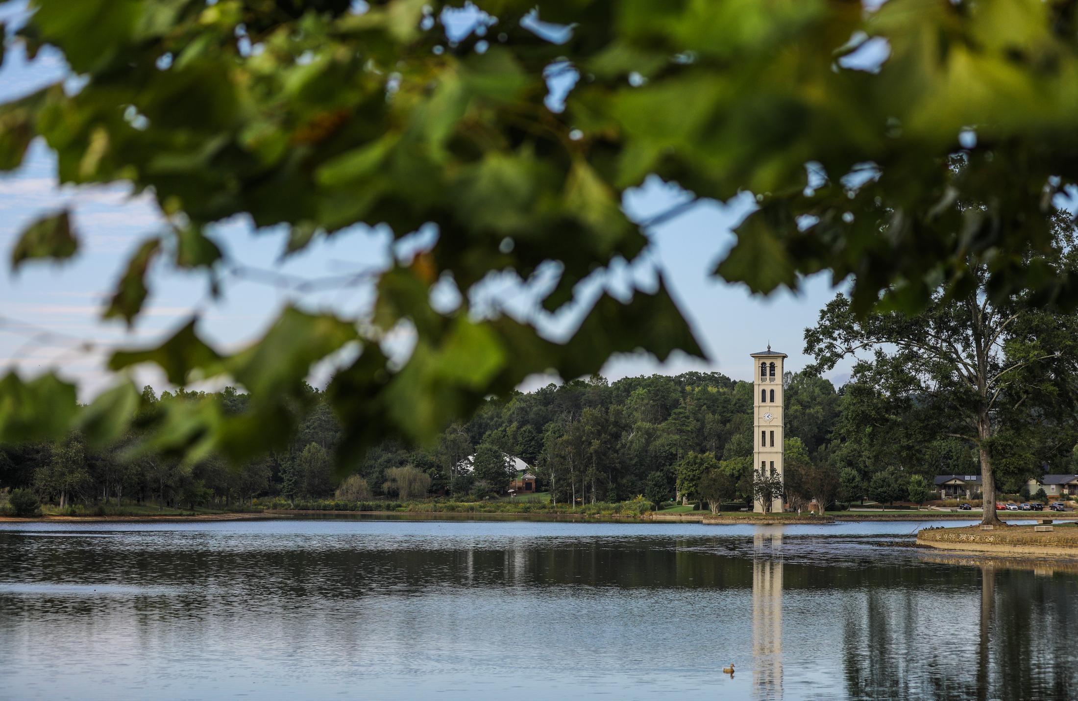 View of the lake and bell tower from afar