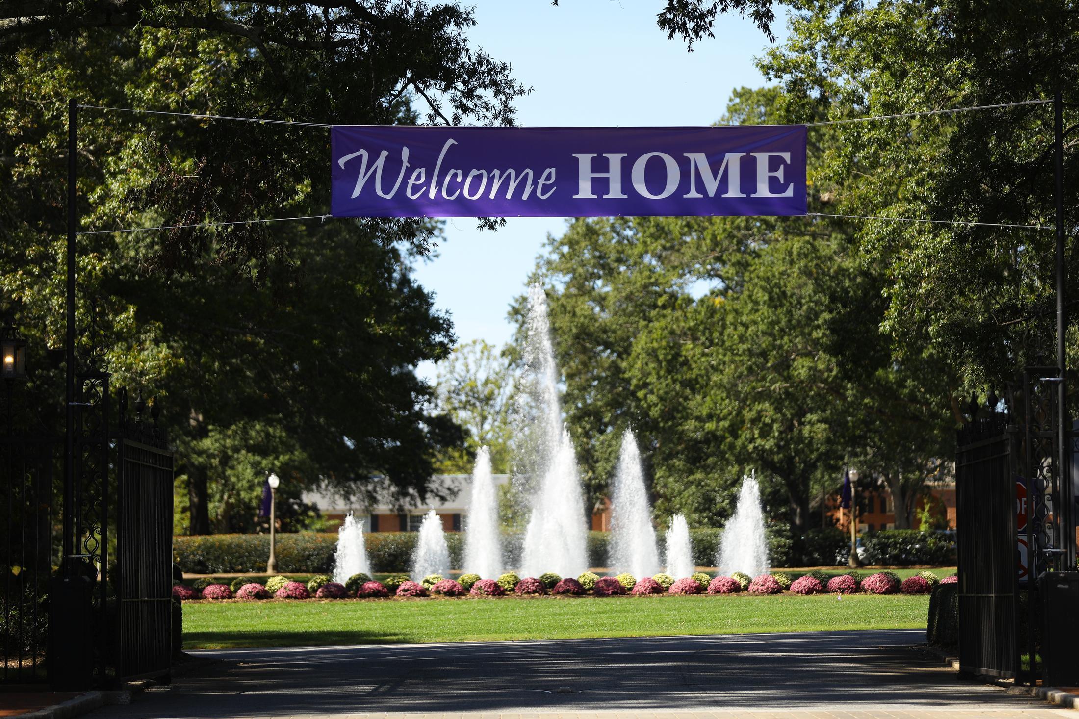 Welcome home banner stretched across the entrance to Furman