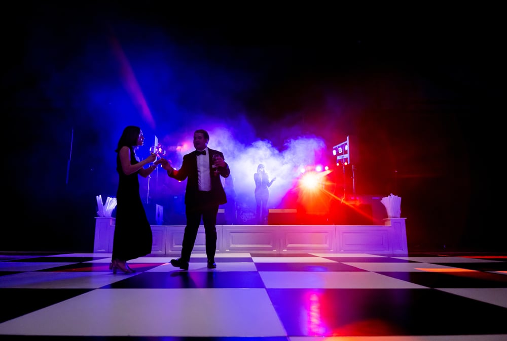 Guests dancing joyfully on the dance floor after the main program