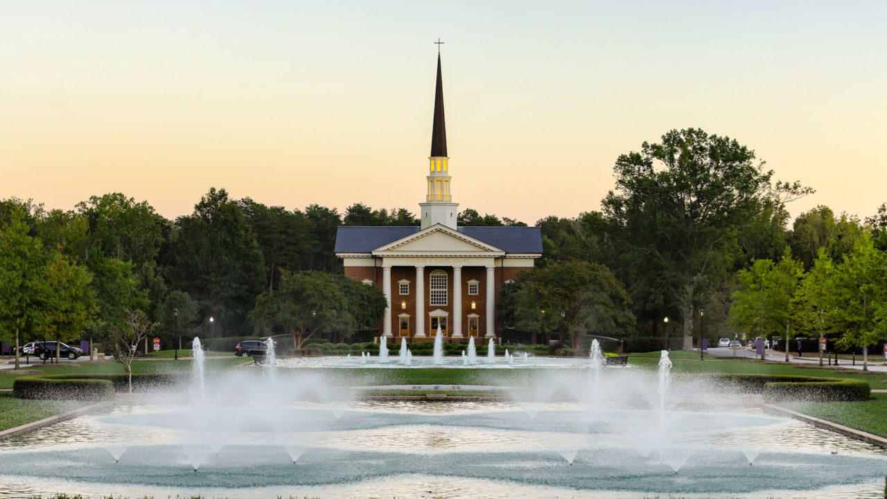 Chapel and fountain at sunset in spring