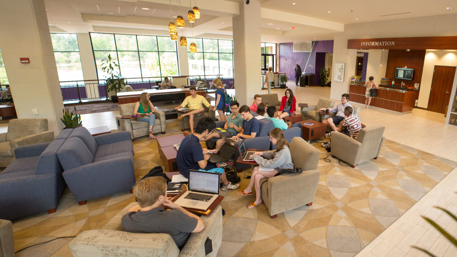 Trone student center pictured with multiple students working