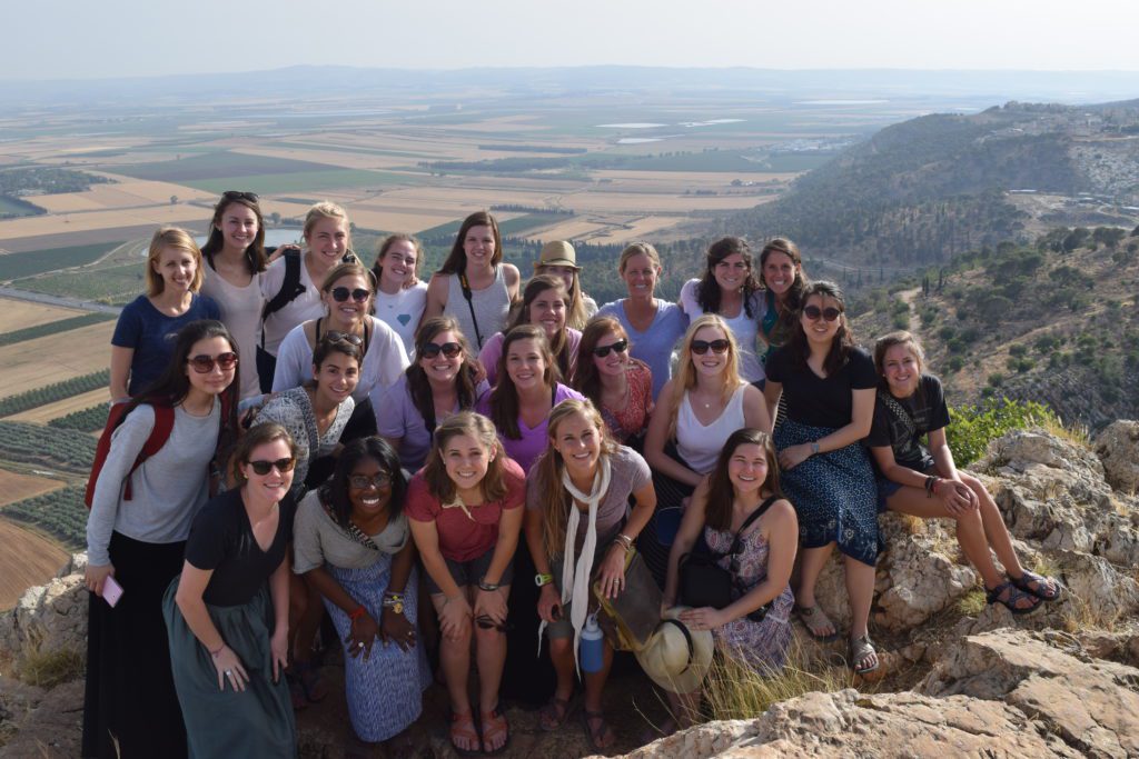Students posing for a photo during a MayX study away program in Israel