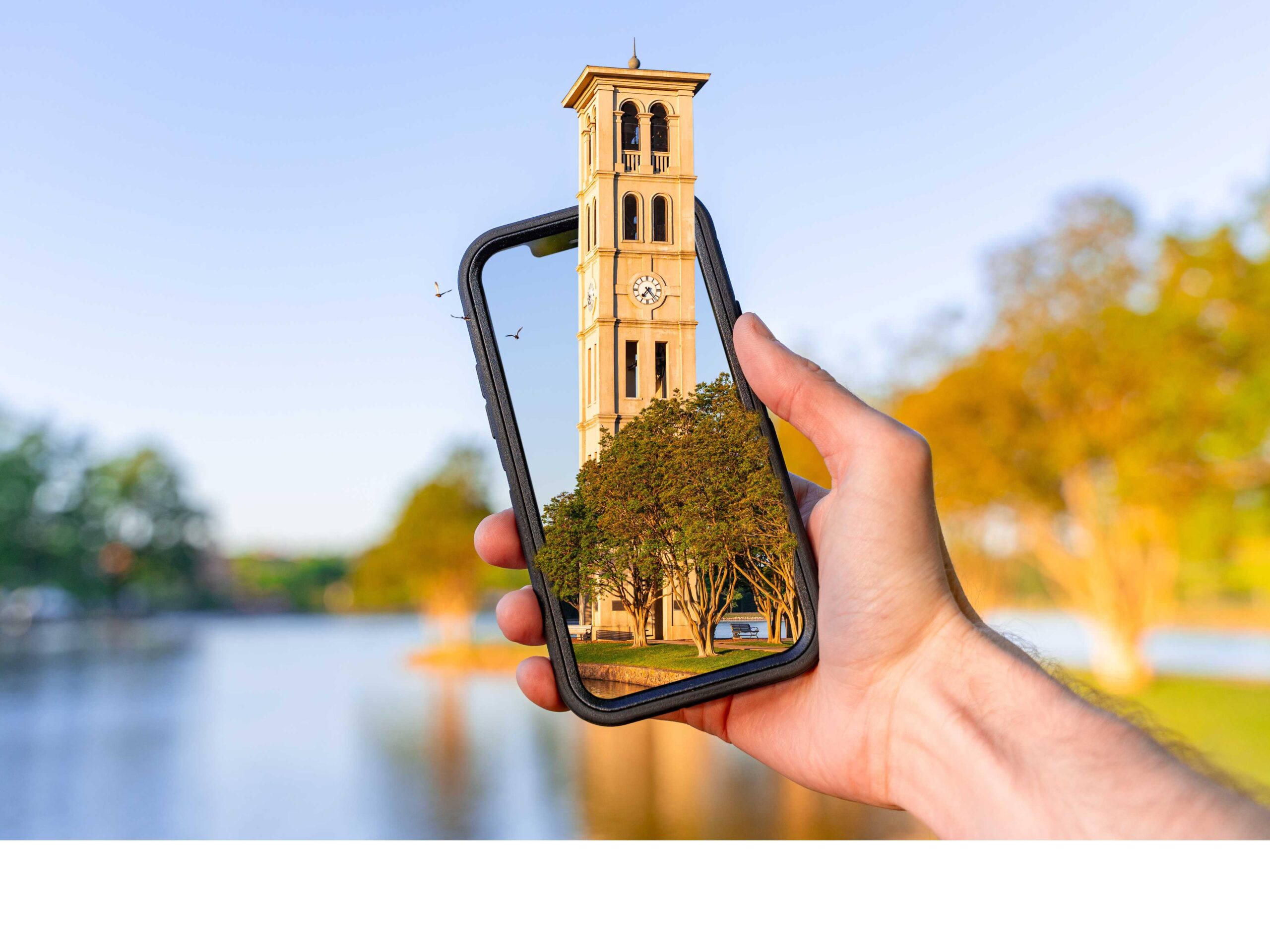 The Bell Tower through an iPhone being held.