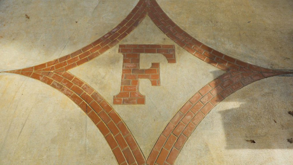Furman insignia on concrete