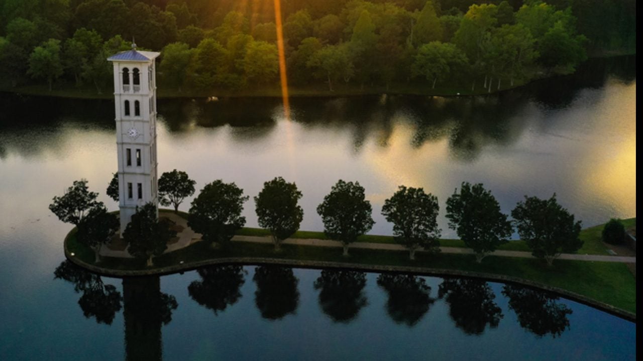 Bell tower aerial view, sunset, view of walking path up to bell tower