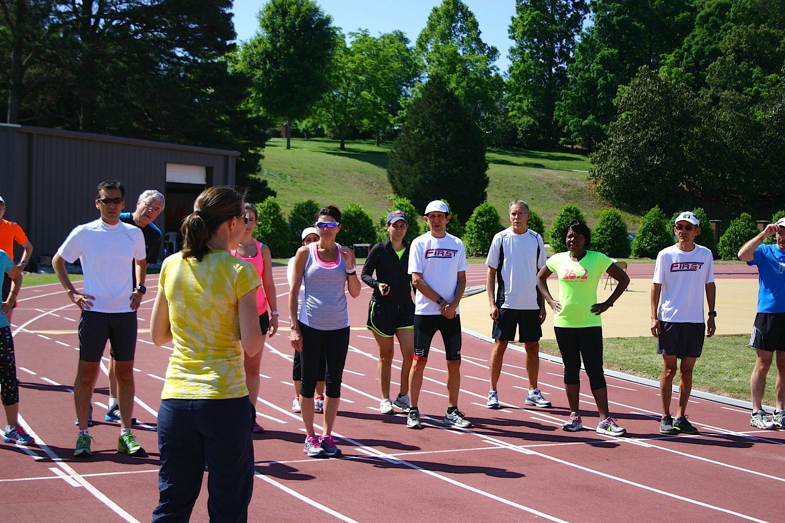 Athletes about to start running around the track