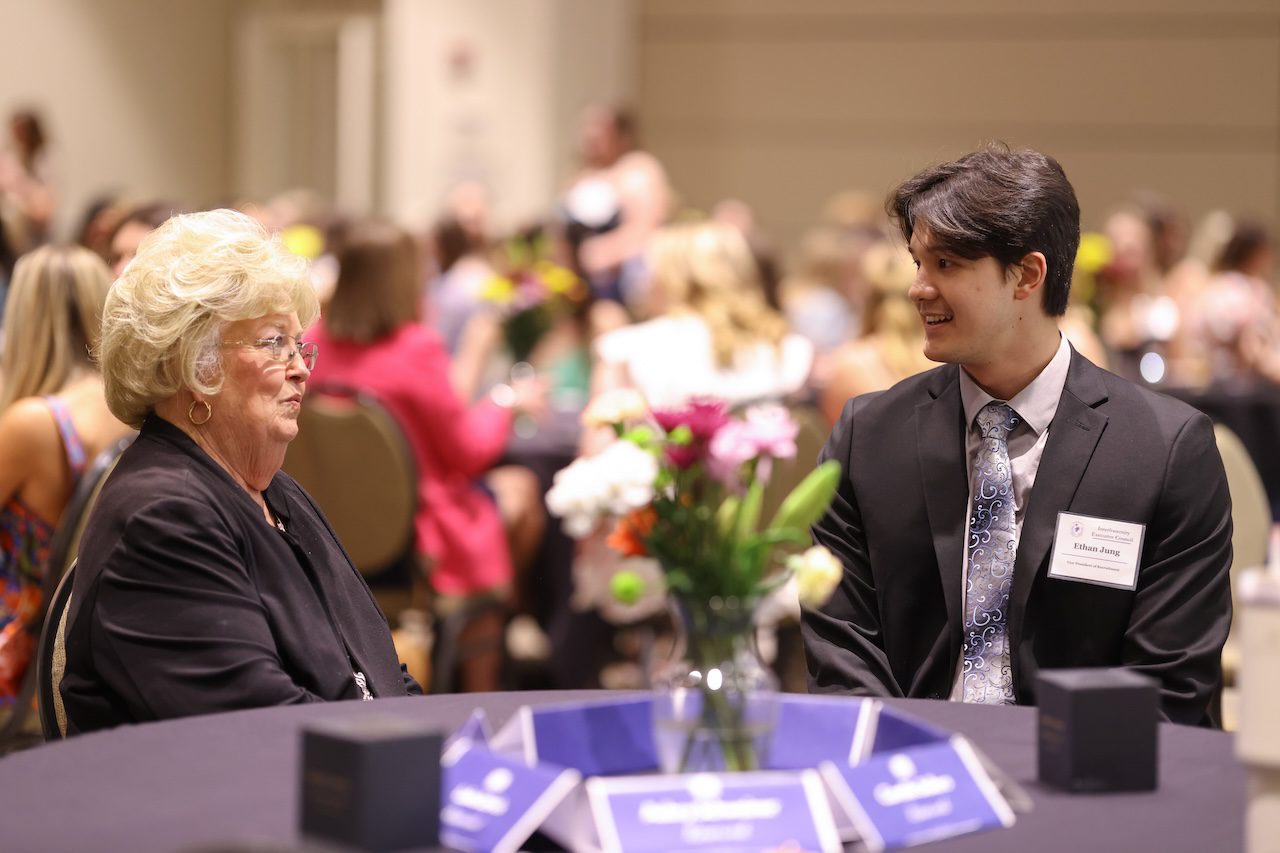 student talking during a ceremony