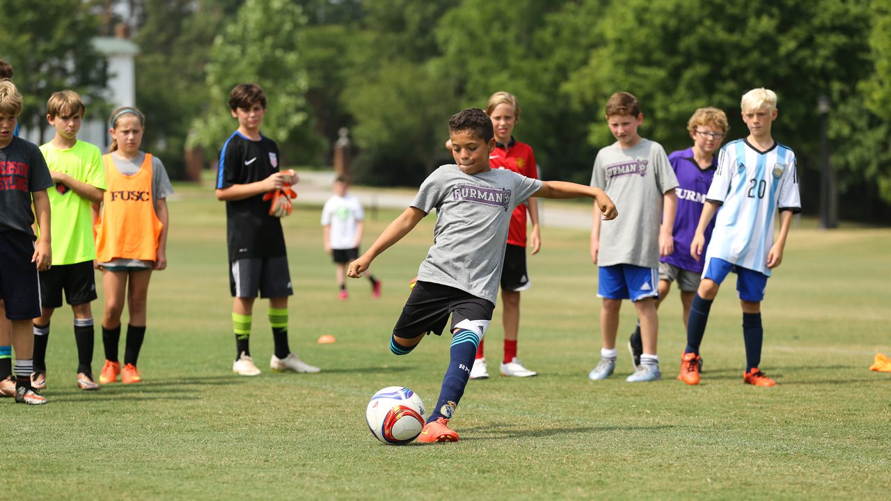 Kids playing soccer