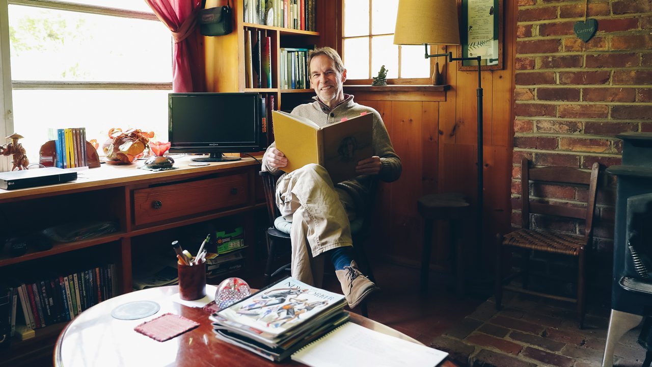Thomas Rain Crowe reading in his office