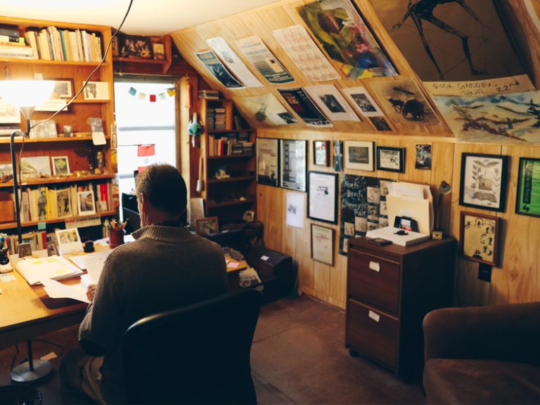 Thomas Rain Crowe working in his office