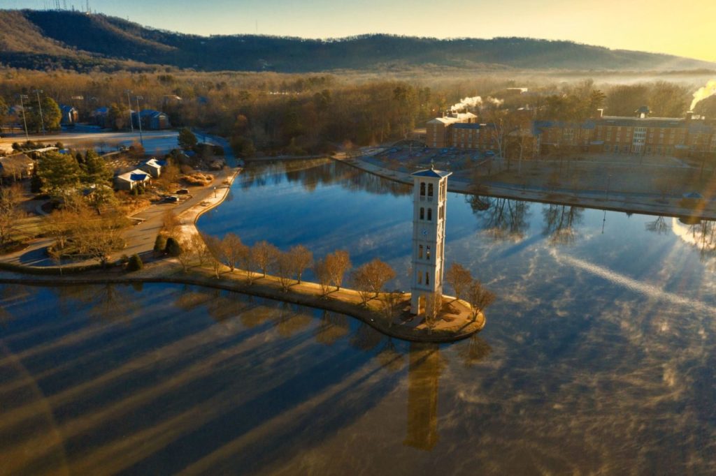 Furman bell tower aerial view with fog on the lake