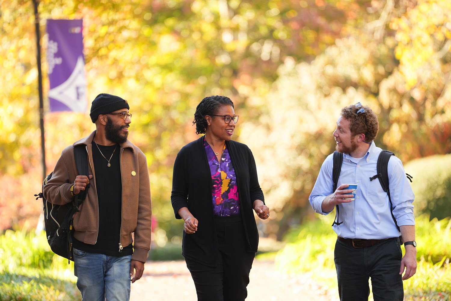 Grad students walking on campus