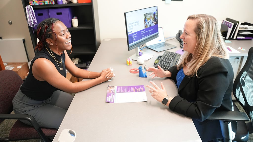 MSCEM Program Coordinator meets with student