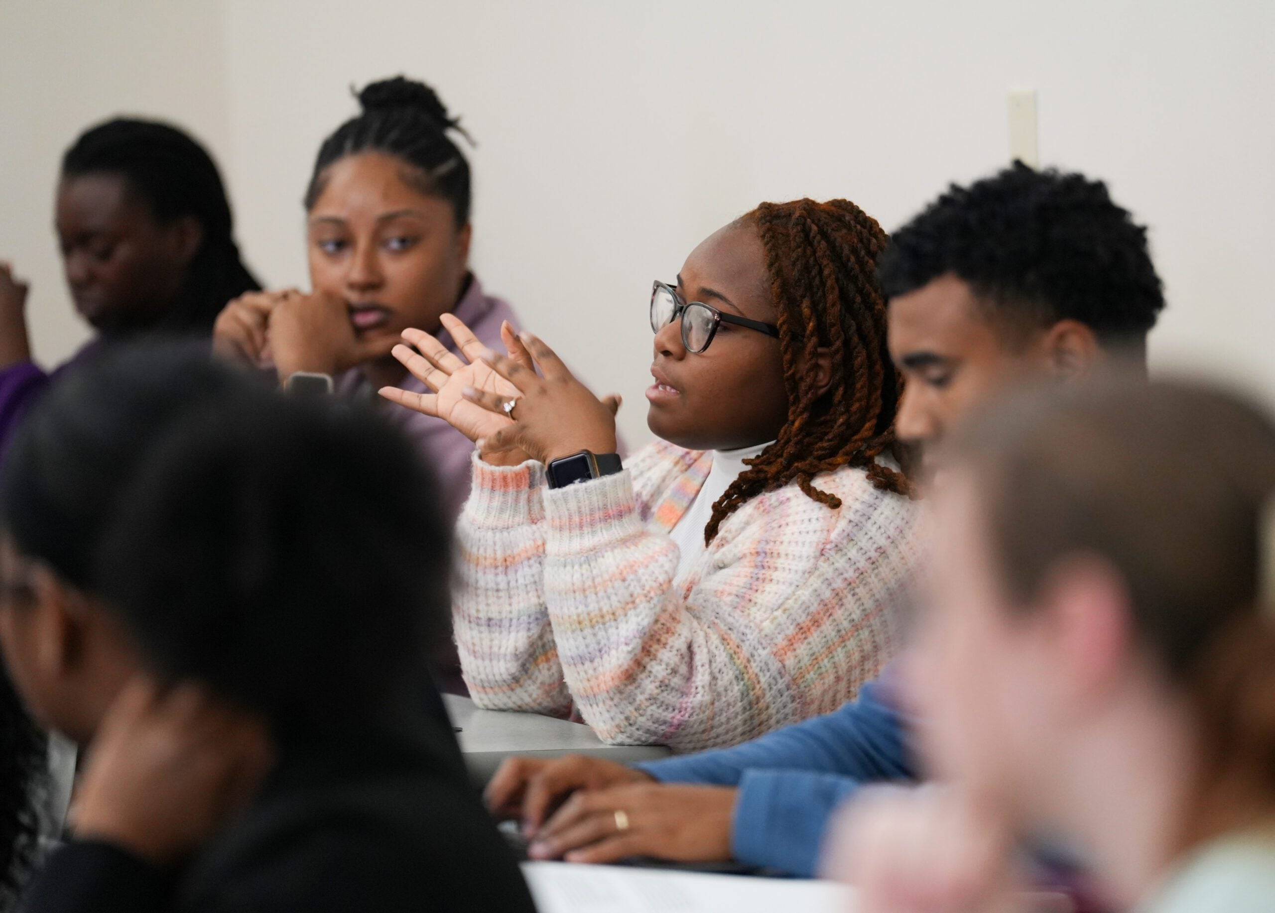 Students sitting in a class.