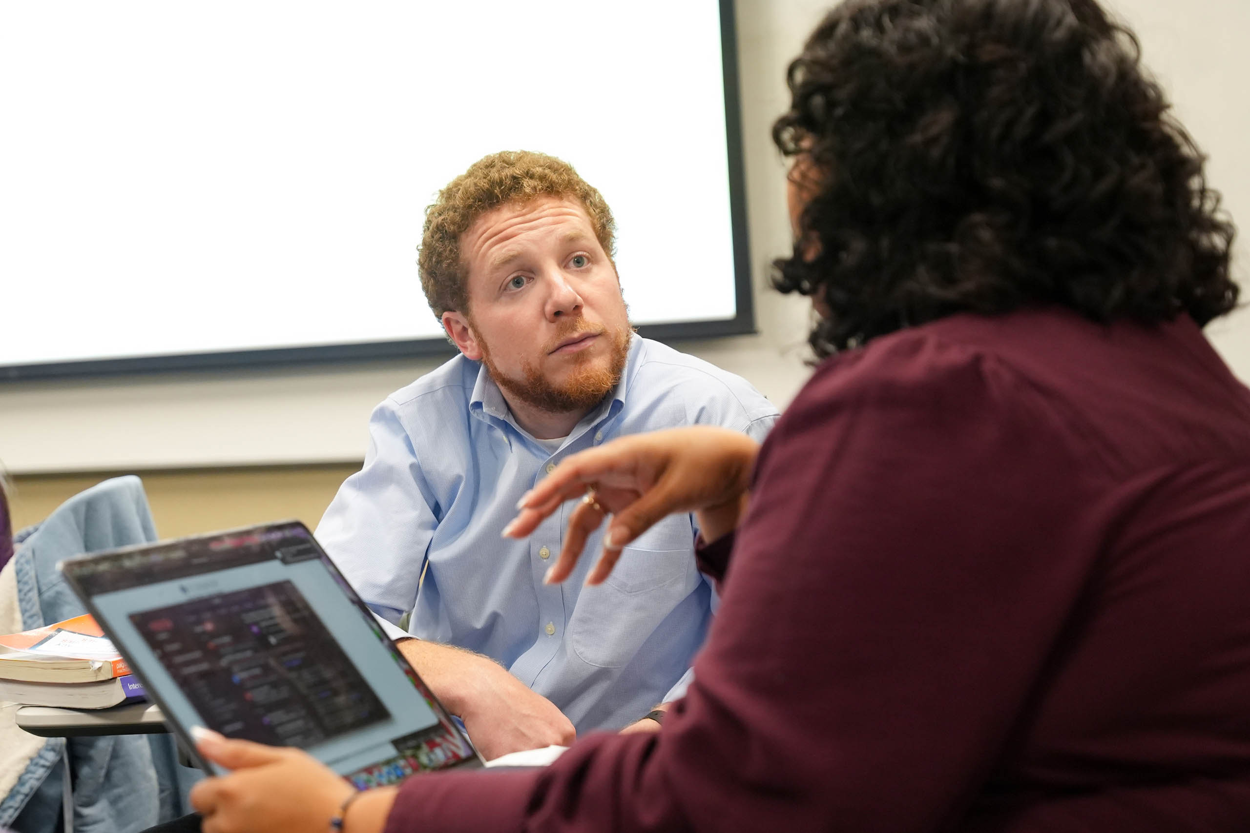 MAP students having a discussion in class.