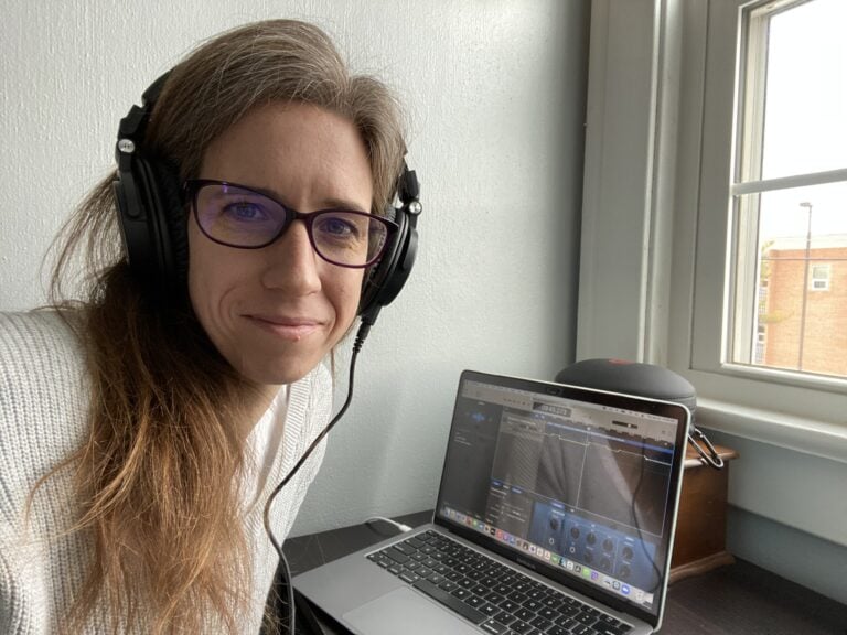 Ashley Dickson Ellison sitting at her computer.