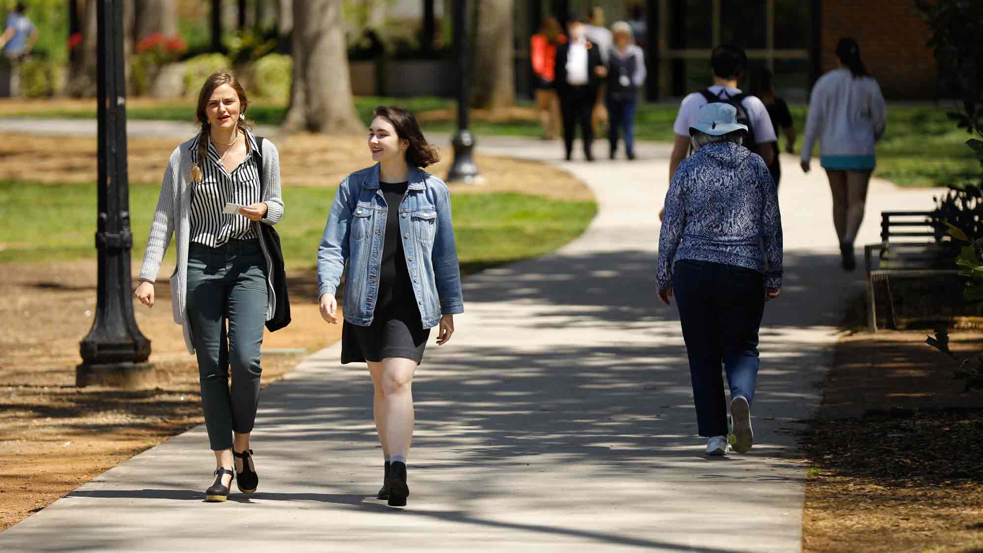 Students walking outside near dining hall
