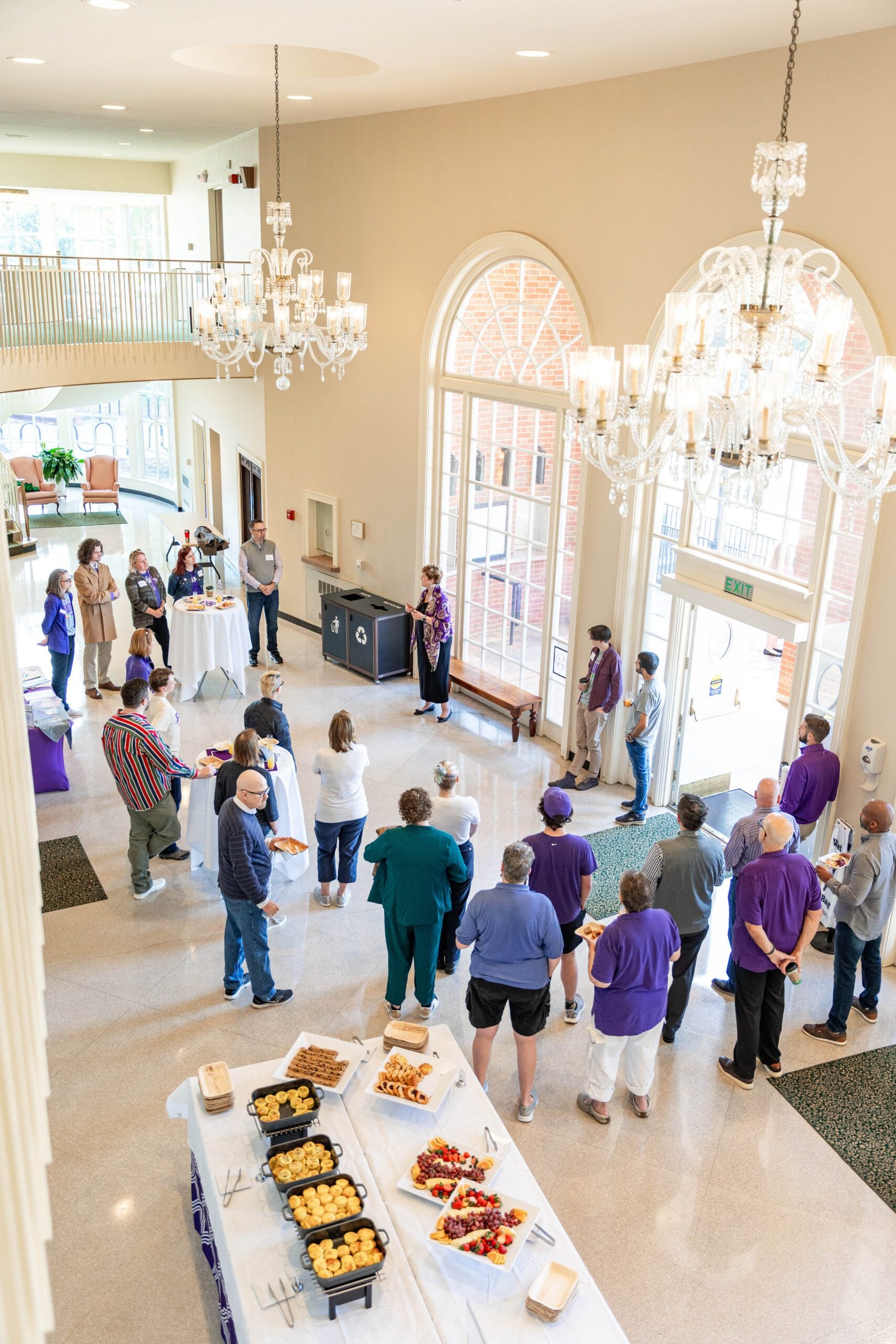 people eating in McAlister Auditorium lobby