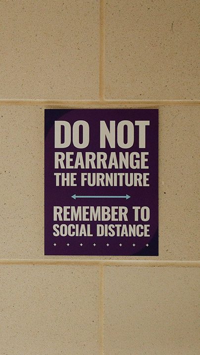 A sign warning students not to rearrange furniture