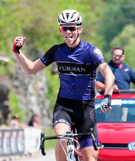 Freshman Brendan Rhim celebrates victory in the USA Cycling Collegiate National Championships.