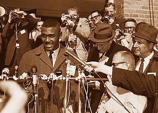 Harvey Gantt speaks at a press conference after becoming the first black student to attend the university.