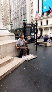 A daily concert on the corner of Wall Street.