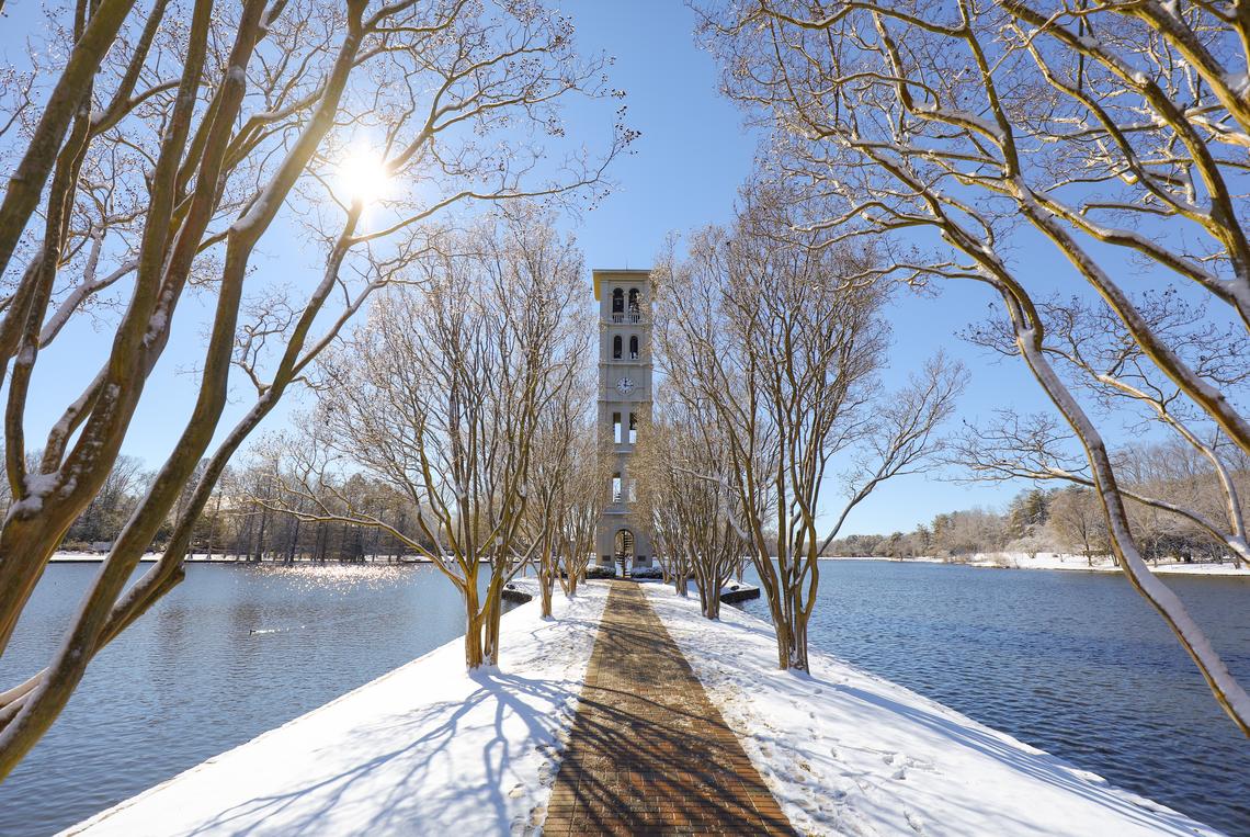 campus bell tower in snow