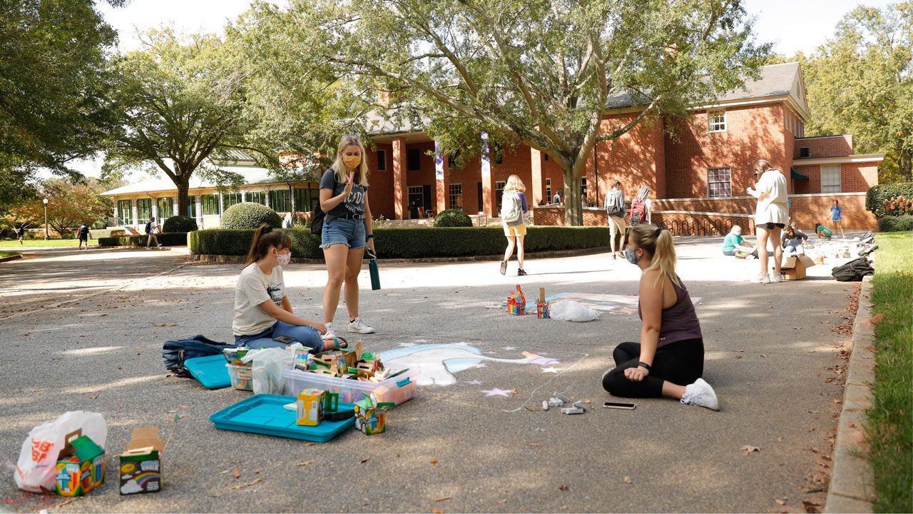 Students participate in a chalking competition during Homecoming 2020.